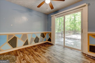 Start collecting lake-life stories before summer slips away on Turtle Cove Golf Course in Georgia - for sale on GolfHomes.com, golf home, golf lot