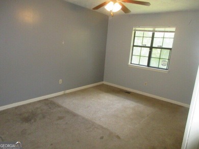 Start collecting lake-life stories before summer slips away on Turtle Cove Golf Course in Georgia - for sale on GolfHomes.com, golf home, golf lot