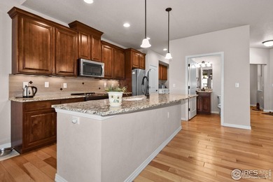 This stunning, impeccably maintained home backing to Ute Creek on Ute Creek Golf Course in Colorado - for sale on GolfHomes.com, golf home, golf lot