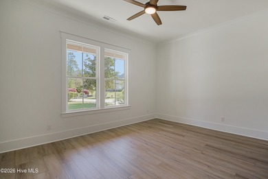 This home is under construction at this timepletion date 6/2026 on Brunswick Plantation and Golf Resorts in North Carolina - for sale on GolfHomes.com, golf home, golf lot