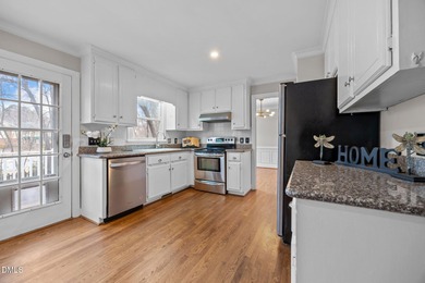 A rocking chair front porch welcomes you to your new home. Enter on Hedingham Golf and Athletic Club in North Carolina - for sale on GolfHomes.com, golf home, golf lot