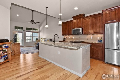 This stunning, impeccably maintained home backing to Ute Creek on Ute Creek Golf Course in Colorado - for sale on GolfHomes.com, golf home, golf lot