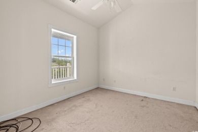 Welcome to this inviting third-level condo offering water views on Palmetto Greens Golf and Country Club in South Carolina - for sale on GolfHomes.com, golf home, golf lot