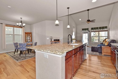 This stunning, impeccably maintained home backing to Ute Creek on Ute Creek Golf Course in Colorado - for sale on GolfHomes.com, golf home, golf lot