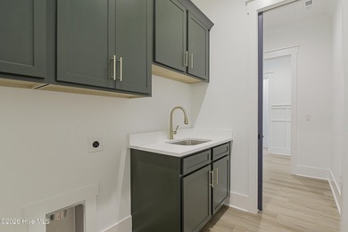 This home is under construction at this timepletion date 6/2026 on Brunswick Plantation and Golf Resorts in North Carolina - for sale on GolfHomes.com, golf home, golf lot