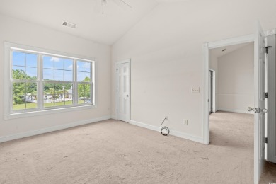 Welcome to this inviting third-level condo offering water views on Palmetto Greens Golf and Country Club in South Carolina - for sale on GolfHomes.com, golf home, golf lot