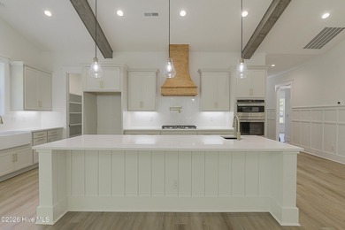 This home is under construction at this timepletion date 6/2026 on Brunswick Plantation and Golf Resorts in North Carolina - for sale on GolfHomes.com, golf home, golf lot