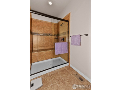 This stunning, impeccably maintained home backing to Ute Creek on Ute Creek Golf Course in Colorado - for sale on GolfHomes.com, golf home, golf lot