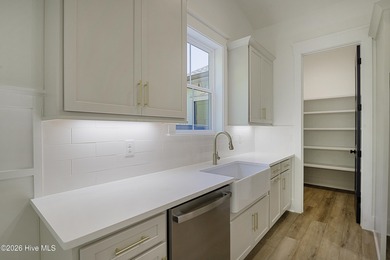 This home is under construction at this timepletion date 6/2026 on Brunswick Plantation and Golf Resorts in North Carolina - for sale on GolfHomes.com, golf home, golf lot