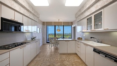 Under contract-accepting backup offers. Island paradise behind on Links on Longboat Golf Club in Florida - for sale on GolfHomes.com, golf home, golf lot