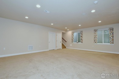 This stunning, impeccably maintained home backing to Ute Creek on Ute Creek Golf Course in Colorado - for sale on GolfHomes.com, golf home, golf lot