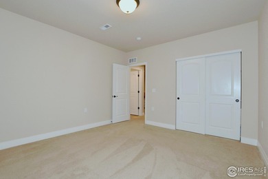 This stunning, impeccably maintained home backing to Ute Creek on Ute Creek Golf Course in Colorado - for sale on GolfHomes.com, golf home, golf lot