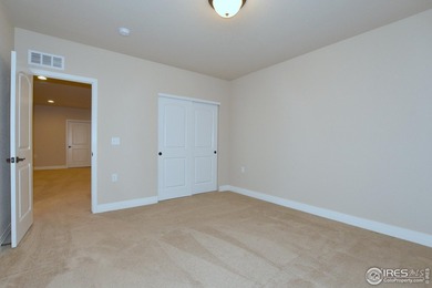 This stunning, impeccably maintained home backing to Ute Creek on Ute Creek Golf Course in Colorado - for sale on GolfHomes.com, golf home, golf lot