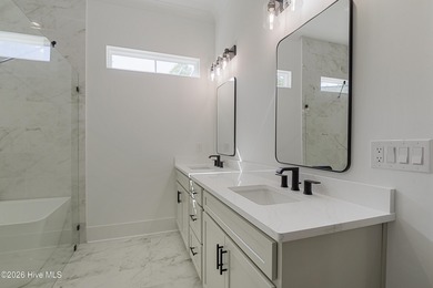 This home is under construction at this timepletion date 6/2026 on Brunswick Plantation and Golf Resorts in North Carolina - for sale on GolfHomes.com, golf home, golf lot