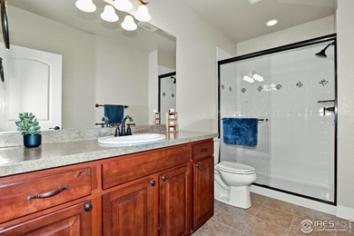 This stunning, impeccably maintained home backing to Ute Creek on Ute Creek Golf Course in Colorado - for sale on GolfHomes.com, golf home, golf lot