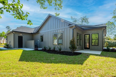 This home is under construction at this timepletion date 6/2026 on Brunswick Plantation and Golf Resorts in North Carolina - for sale on GolfHomes.com, golf home, golf lot