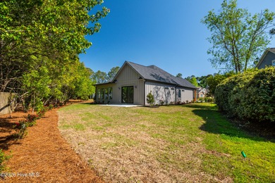 This home is under construction at this timepletion date 6/2026 on Brunswick Plantation and Golf Resorts in North Carolina - for sale on GolfHomes.com, golf home, golf lot