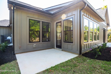 This home is under construction at this timepletion date 6/2026 on Brunswick Plantation and Golf Resorts in North Carolina - for sale on GolfHomes.com, golf home, golf lot