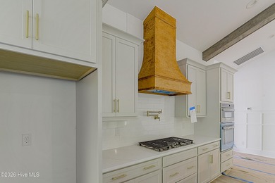 This home is under construction at this timepletion date 6/2026 on Brunswick Plantation and Golf Resorts in North Carolina - for sale on GolfHomes.com, golf home, golf lot