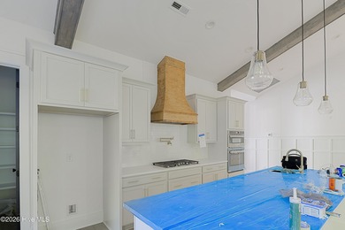 This home is under construction at this timepletion date 6/2026 on Brunswick Plantation and Golf Resorts in North Carolina - for sale on GolfHomes.com, golf home, golf lot