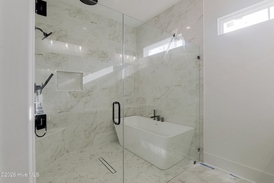 This home is under construction at this timepletion date 6/2026 on Brunswick Plantation and Golf Resorts in North Carolina - for sale on GolfHomes.com, golf home, golf lot