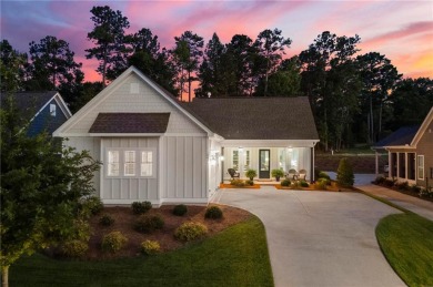 This Craftsman-style cottage is the Solitary Eagle floorplan on Grand National Golf Course in Alabama - for sale on GolfHomes.com, golf home, golf lot