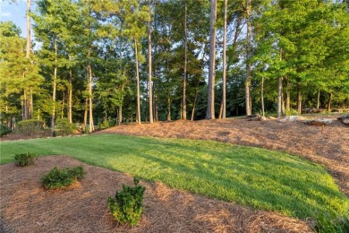 This Craftsman-style cottage is the Solitary Eagle floorplan on Grand National Golf Course in Alabama - for sale on GolfHomes.com, golf home, golf lot