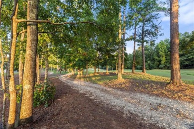 This Craftsman-style cottage is the Solitary Eagle floorplan on Grand National Golf Course in Alabama - for sale on GolfHomes.com, golf home, golf lot