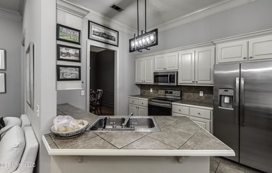 NEW ROOF - FEBRUARY 2026! Experience resort style living in this on Lake Caroline Golf Club in Mississippi - for sale on GolfHomes.com, golf home, golf lot