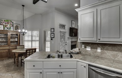 NEW ROOF - FEBRUARY 2026! Experience resort style living in this on Lake Caroline Golf Club in Mississippi - for sale on GolfHomes.com, golf home, golf lot