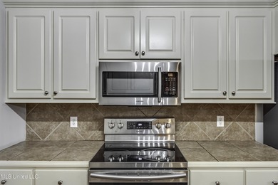 NEW ROOF - FEBRUARY 2026! Experience resort style living in this on Lake Caroline Golf Club in Mississippi - for sale on GolfHomes.com, golf home, golf lot