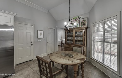 NEW ROOF - FEBRUARY 2026! Experience resort style living in this on Lake Caroline Golf Club in Mississippi - for sale on GolfHomes.com, golf home, golf lot