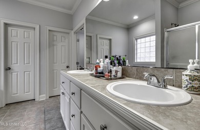 NEW ROOF - FEBRUARY 2026! Experience resort style living in this on Lake Caroline Golf Club in Mississippi - for sale on GolfHomes.com, golf home, golf lot