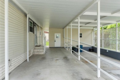 IMPRESSIVE, REMODELED, and UPGRADED HOME with CARPORT...AND...RV on Brookridge Country Club in Florida - for sale on GolfHomes.com, golf home, golf lot