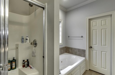 NEW ROOF - FEBRUARY 2026! Experience resort style living in this on Lake Caroline Golf Club in Mississippi - for sale on GolfHomes.com, golf home, golf lot