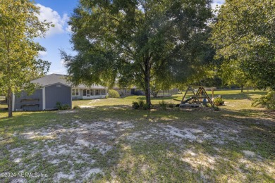 Welcome home to like new construction on the golf course! on Keystone Heights Golf and Country Club in Florida - for sale on GolfHomes.com, golf home, golf lot