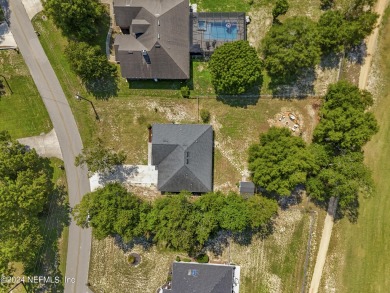 Welcome home to like new construction on the golf course! on Keystone Heights Golf and Country Club in Florida - for sale on GolfHomes.com, golf home, golf lot