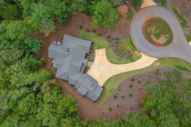 This, luxurious home is located in the sought-after Creek on Reynolds Lake Oconee - The Oconee in Georgia - for sale on GolfHomes.com, golf home, golf lot