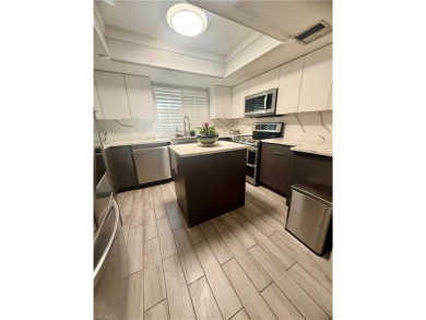 Welcome to this stunning corner unit located on the first floor on LaPlaya Golf Club in Florida - for sale on GolfHomes.com, golf home, golf lot
