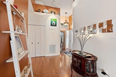 Welcome to this charming 3-bedroom, 2-bathroom WATERFRONT home on East Lake Woodlands Country Club in Florida - for sale on GolfHomes.com, golf home, golf lot