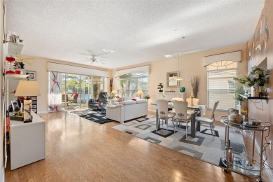 Welcome to this charming 3-bedroom, 2-bathroom WATERFRONT home on East Lake Woodlands Country Club in Florida - for sale on GolfHomes.com, golf home, golf lot