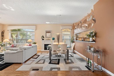 Welcome to this charming 3-bedroom, 2-bathroom WATERFRONT home on East Lake Woodlands Country Club in Florida - for sale on GolfHomes.com, golf home, golf lot