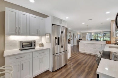 Step into luxury with this expanded first-floor Eastgate condo on Hunters Run Golf and Country Club in Florida - for sale on GolfHomes.com, golf home, golf lot