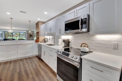 Step into luxury with this expanded first-floor Eastgate condo on Hunters Run Golf and Country Club in Florida - for sale on GolfHomes.com, golf home, golf lot