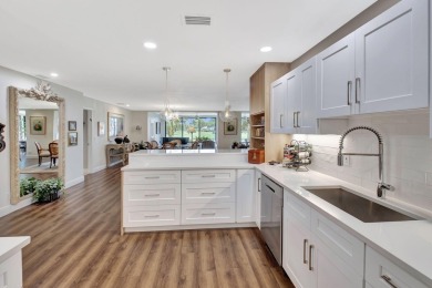 Step into luxury with this expanded first-floor Eastgate condo on Hunters Run Golf and Country Club in Florida - for sale on GolfHomes.com, golf home, golf lot