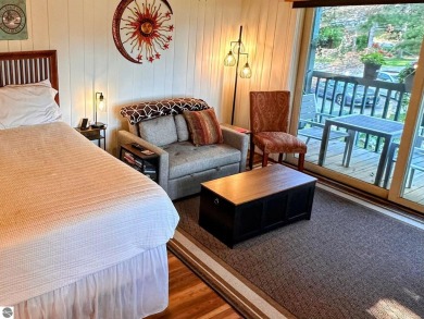 Newly Renovated Lake View Condo at Windcliff Association. On the on Shanty Creek Golf Course in Michigan - for sale on GolfHomes.com, golf home, golf lot