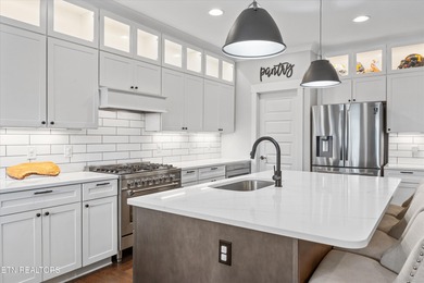 Luxury and leisure come together beautifully at 104 Forest Creek on Oak Ridge Country Club in Tennessee - for sale on GolfHomes.com, golf home, golf lot