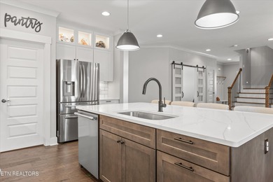 Luxury and leisure come together beautifully at 104 Forest Creek on Oak Ridge Country Club in Tennessee - for sale on GolfHomes.com, golf home, golf lot