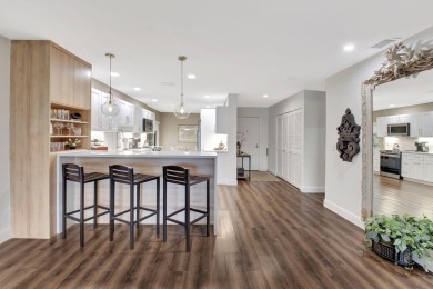 Step into luxury with this expanded first-floor Eastgate condo on Hunters Run Golf and Country Club in Florida - for sale on GolfHomes.com, golf home, golf lot