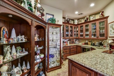 Experience luxury in this netzero, solar-powered on Superstition Mountain Club - Lost Gold in Arizona - for sale on GolfHomes.com, golf home, golf lot
